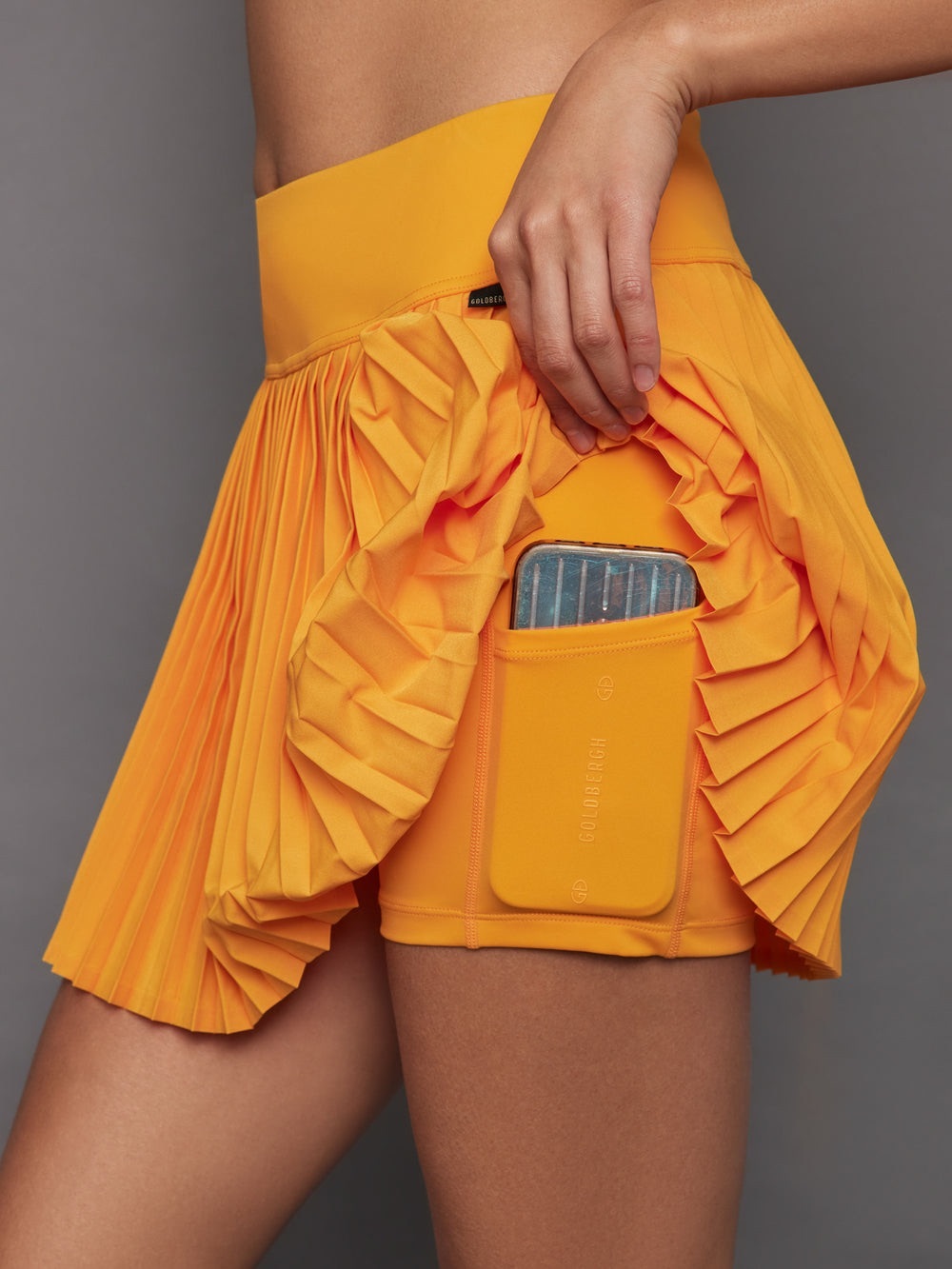 Goldbergh Plisee Bright Orange Pleated Tennis Skirt with Built-In Shorts